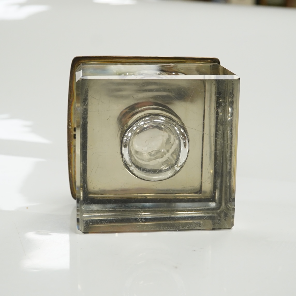 A George V silver lidded glass square inkwell, by Henry Matthews, Birmingham, 1929, width 95mm. Condition - poor to fair